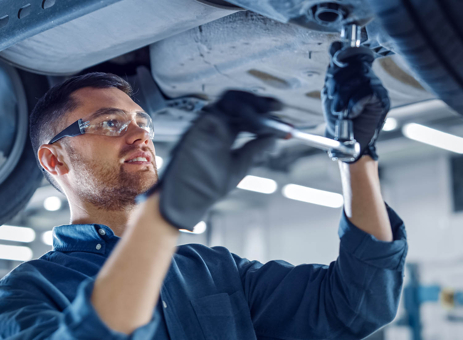 mechanic working on vehicle