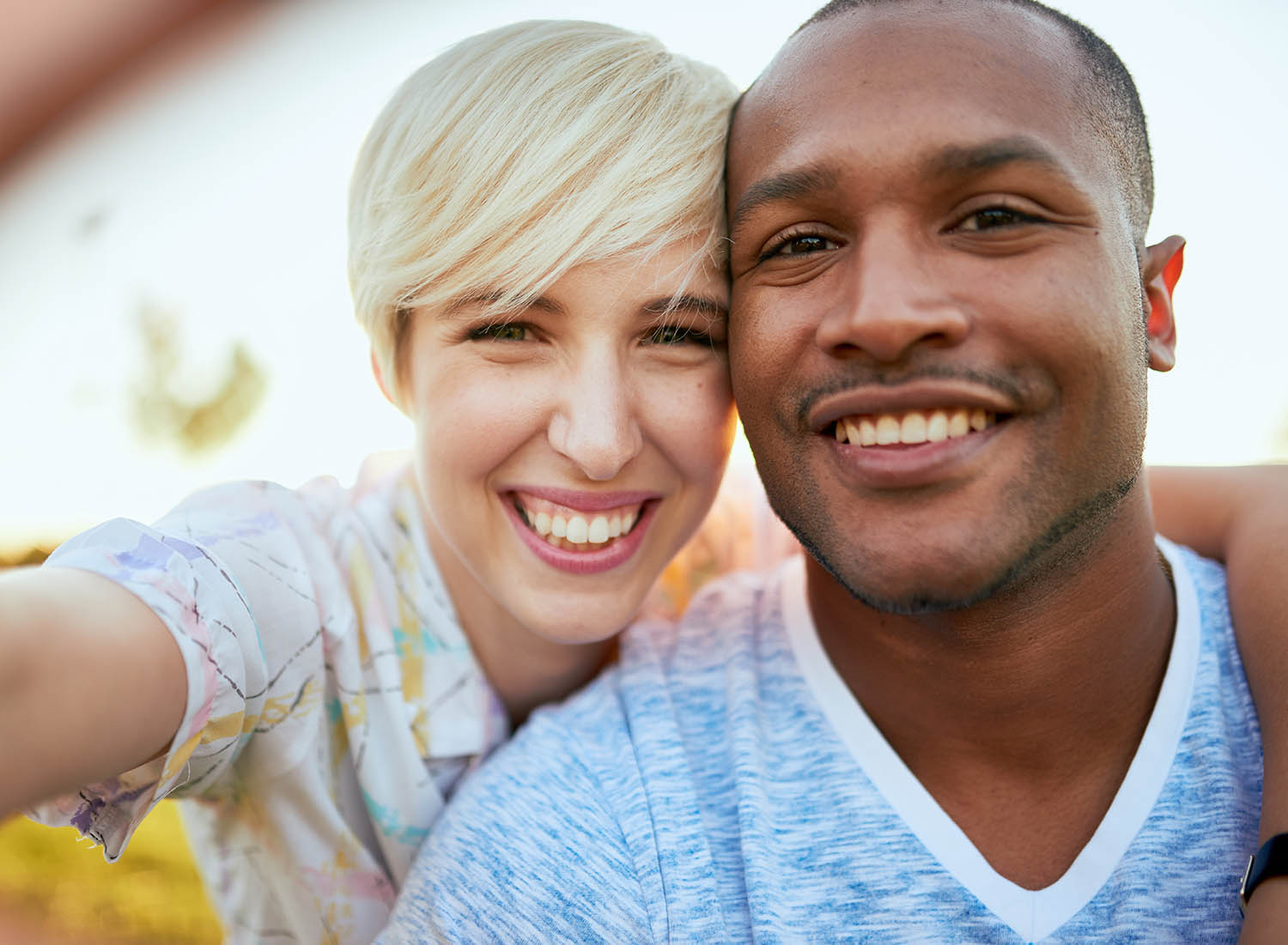 High Interest Checking Account man and woman smiling at the camera