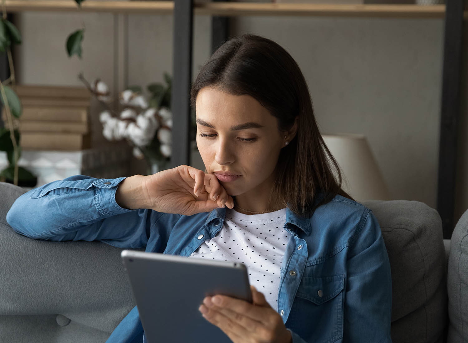 Second Chance Checking Accounts woman looking at ipad